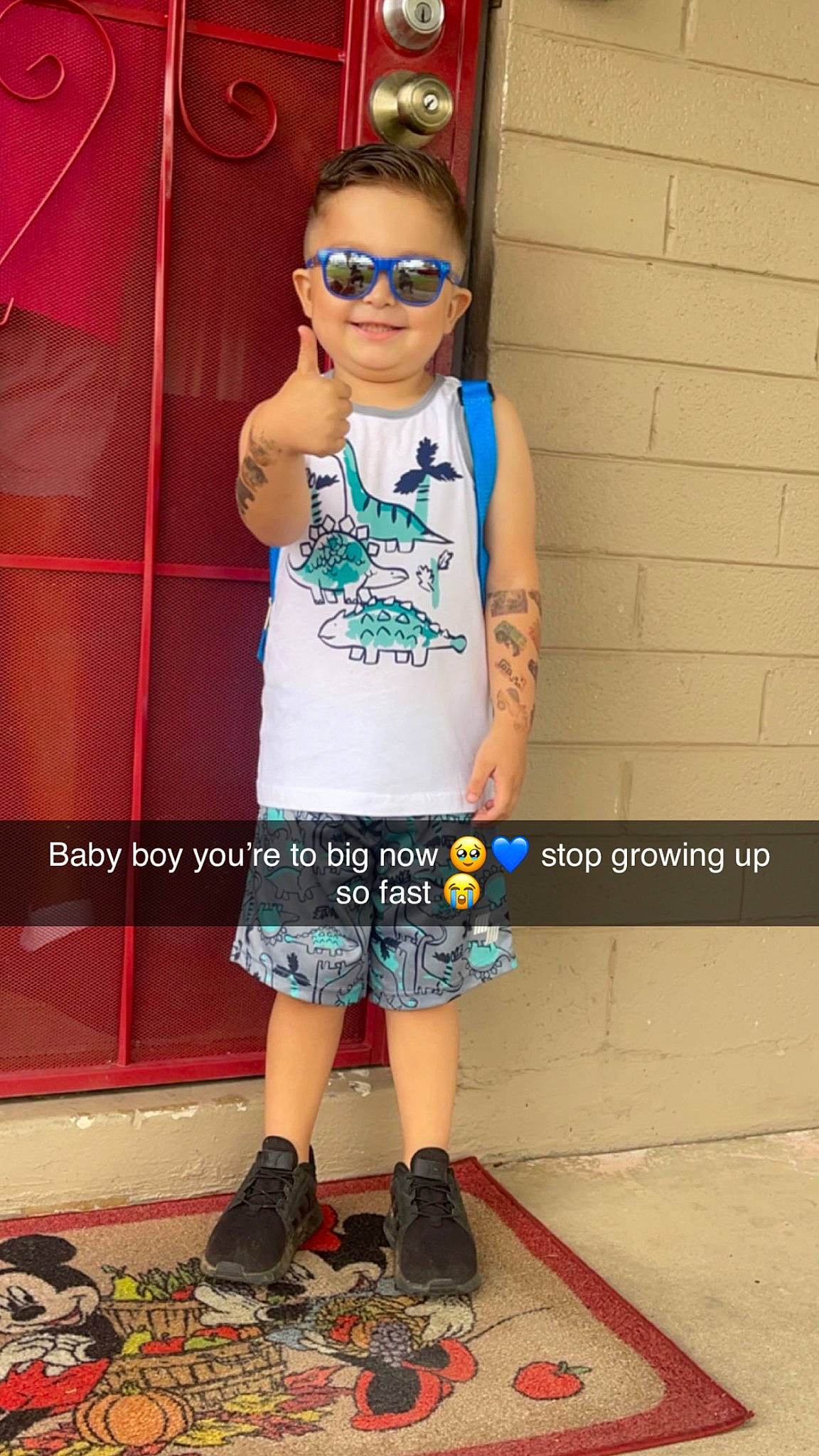 Aiden is registered to the contest to win money with this photo: cool, denim, electric_blue, eyewear, fashion_design, goggles, human_leg, joy, knee, person, shorts, shoulder, sleeve, sneakers, sock, sportswear, sunglasses, t_shirt, thigh, vision_care