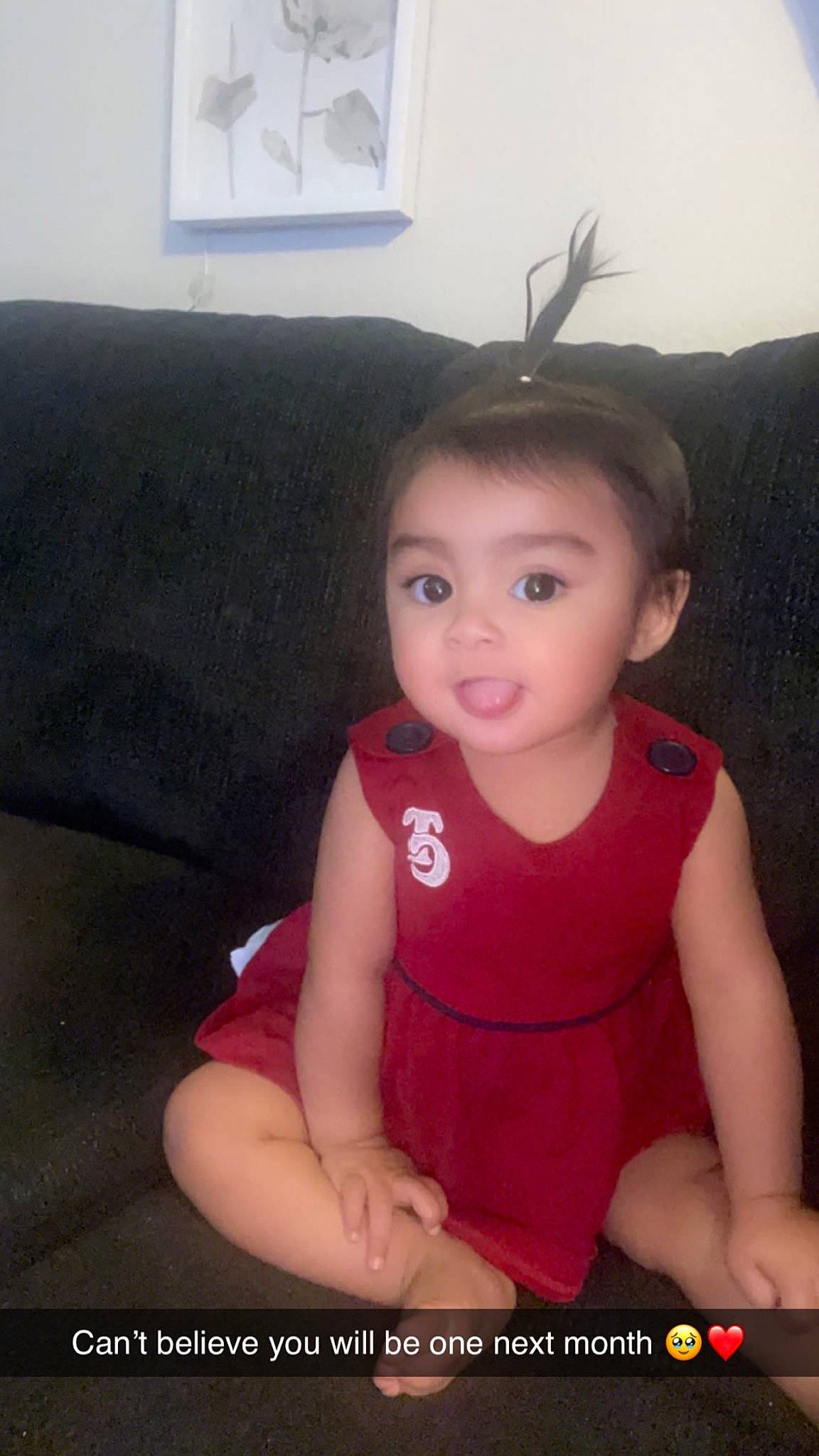 Arya is registered to the contest to win money with this photo: baby, baby_toddler_clothing, cheek, child, comfort, couch, day_dress, eyelash, fun, happy, headpiece, magenta, neck, person, sitting, skin, sleeve, smile, studio_couch, surprise