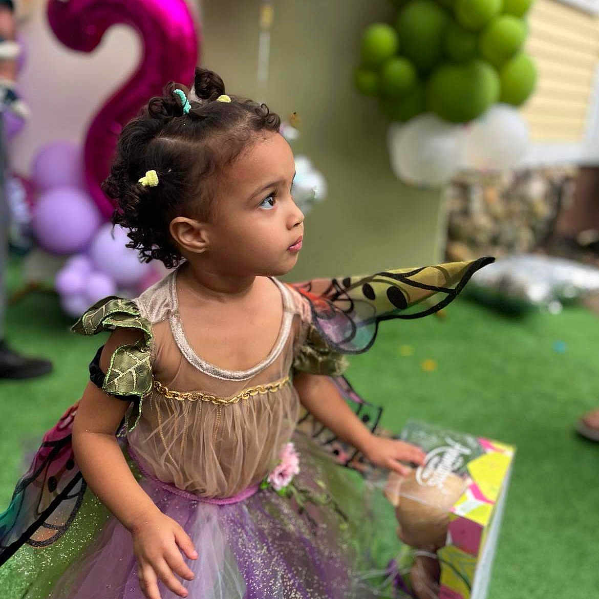 Malayah joined the competition — help win amazing prizes! blackhair, child, clothing, costume, dress, face, female, festival, fun, girl, hair, head, parade, party, people, person, photography, portrait, sitting, sleeve