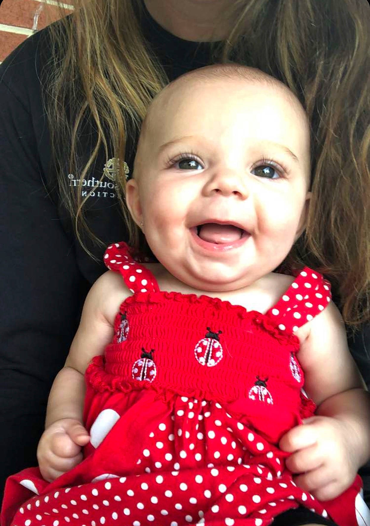 Berkley joined the competition — help win amazing prizes! baby, baby_toddler_clothing, cheek, child, design, dress, face, facial_expression, happy, head, iris, lip, pattern, person, polka_dot, red, sitting, skin, smile, toddler