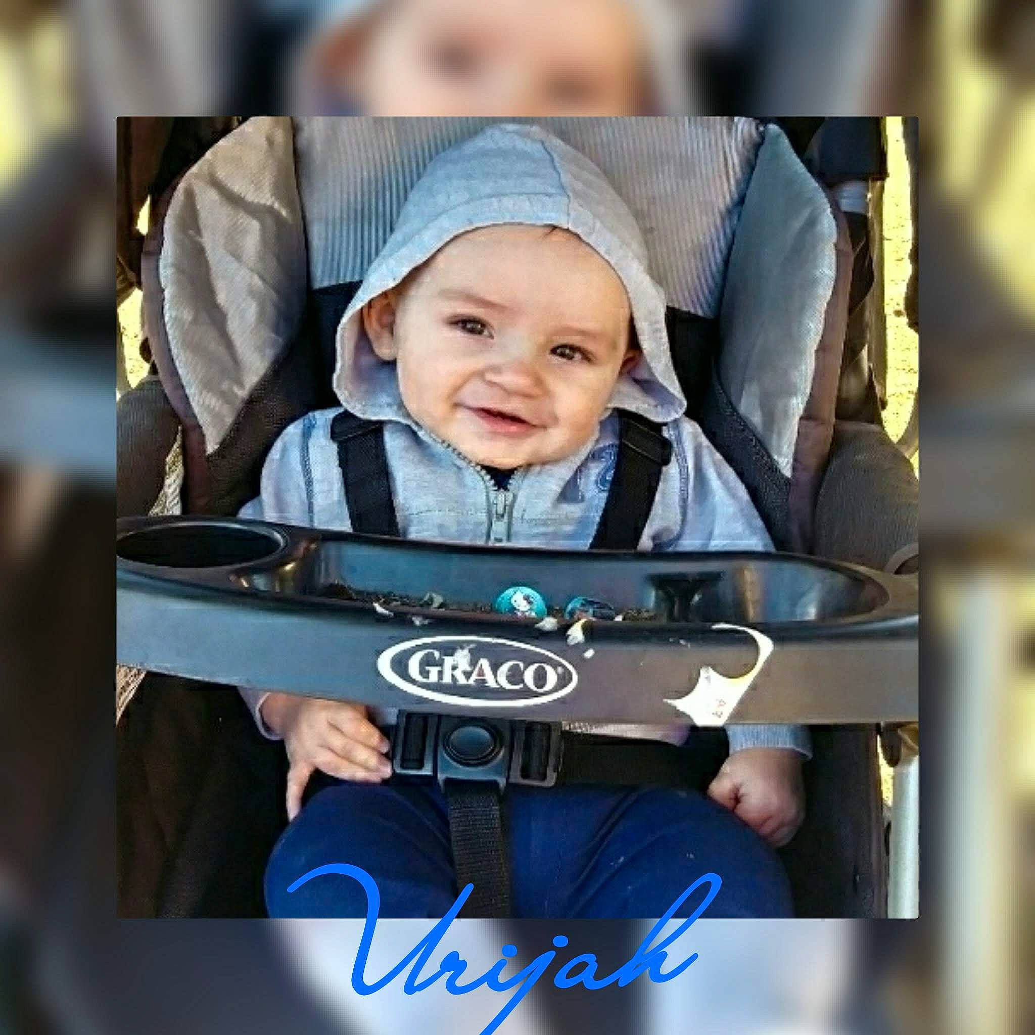 Urijah is registered to the contest to win money with this photo: baby, baby_carriage, baby_products, child, person, photograph, photography, product, smile, toddler