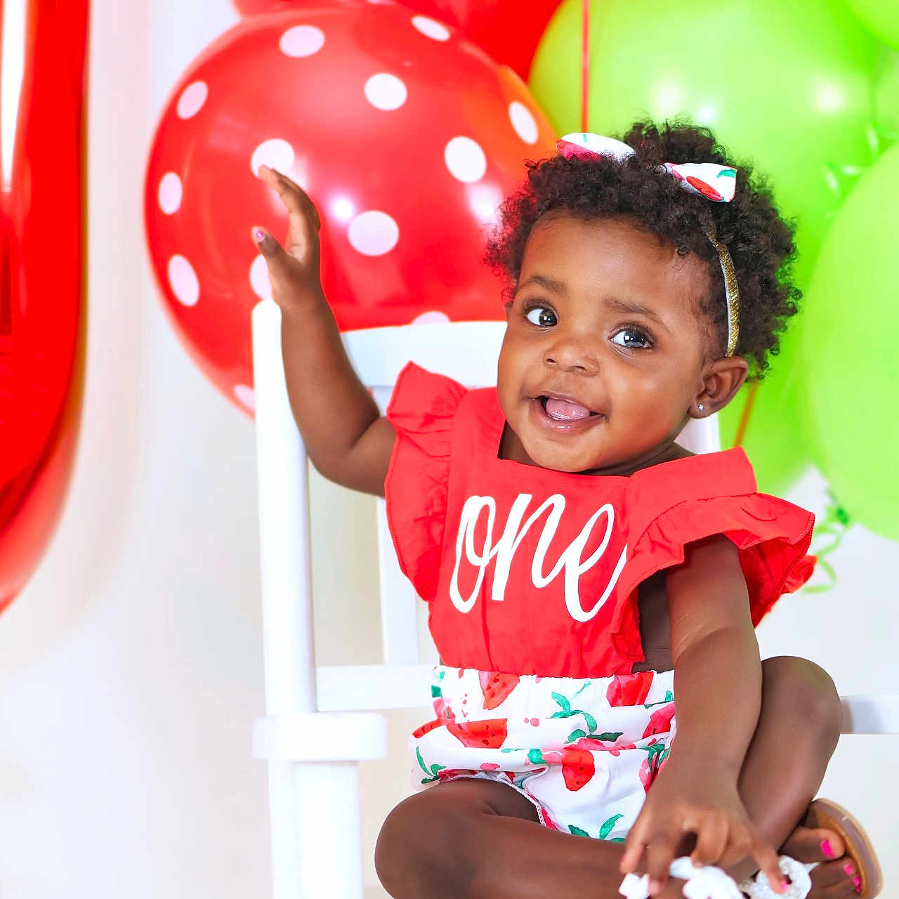 Maliah is registered to the contest to win money with this photo: balloon, bodypart, chair, child, clothing, dress, face, female, footwear, furniture, girl, happy, head, person, photography, portrait, shoe, sitting, smile, t_shirt