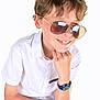 child, boy, sunglasses, white_shirt, watch, smile, portrait, casual, short_sleeves, reflection, young, fashion, cool, jeans, hand_on_chin, studio, isolated, happy, cute, hair