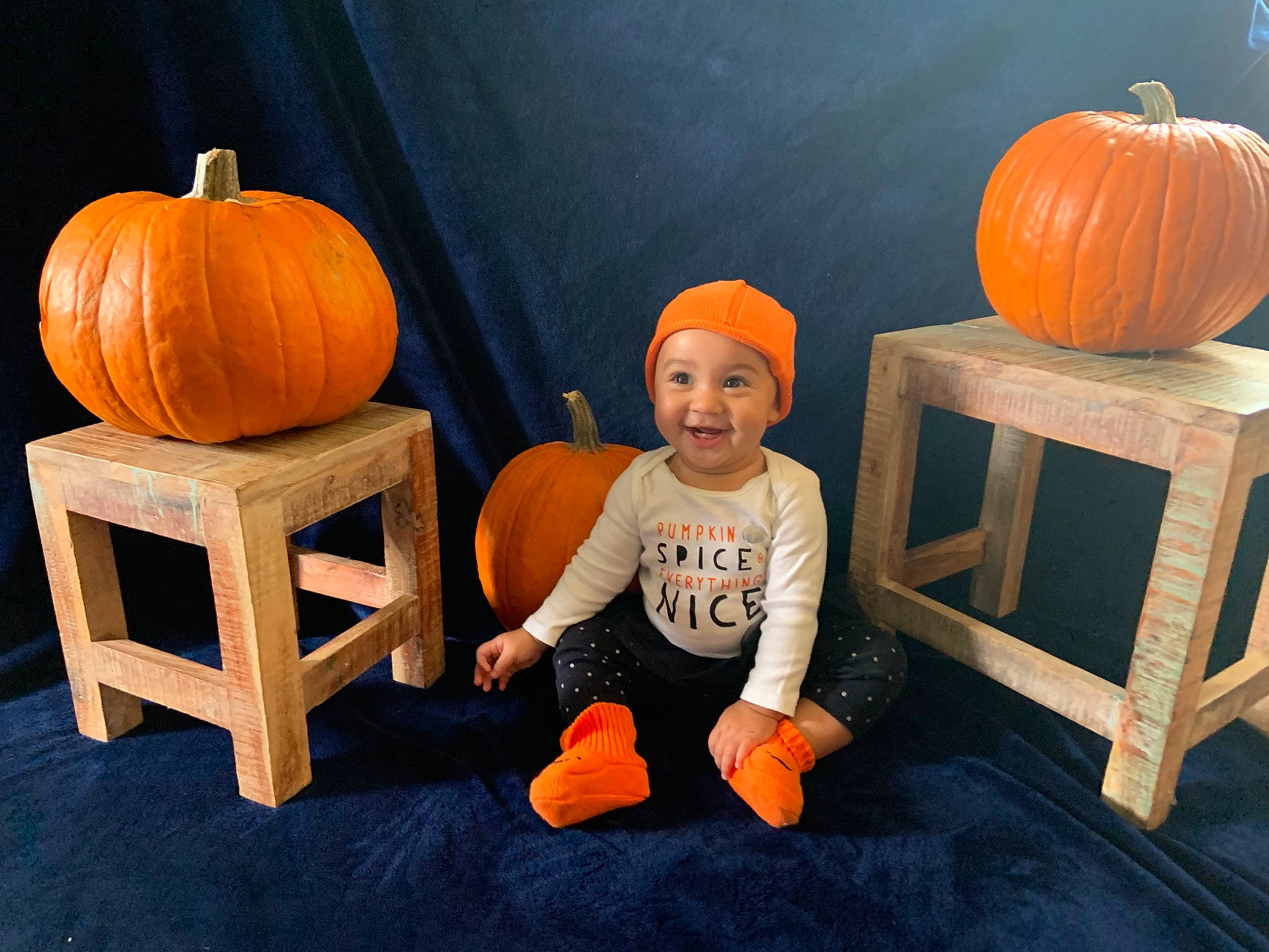 Adelina joined the competition — help win amazing prizes! art, calabaza, carving, child, cucurbita, food, fruit, furniture, gourd, headwear, jack_o_lantern, joy, orange, person, plant, pumpkin, sitting, squash, table, toddler