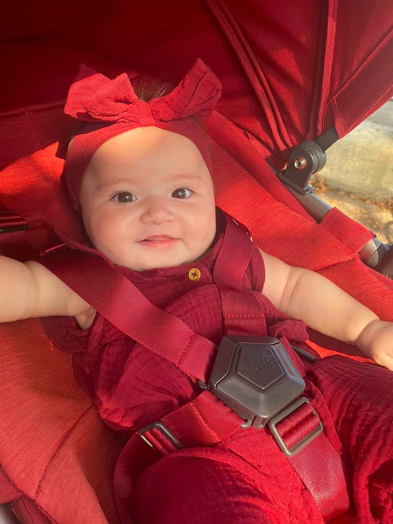 Alani joined the competition — help win amazing prizes! baby, baby_carriage, baby_toddler_clothing, cheek, comfort, cool, eye, facial_expression, finger, fun, head, headwear, lap, mouth, organ, person, pink, product, skin, smile