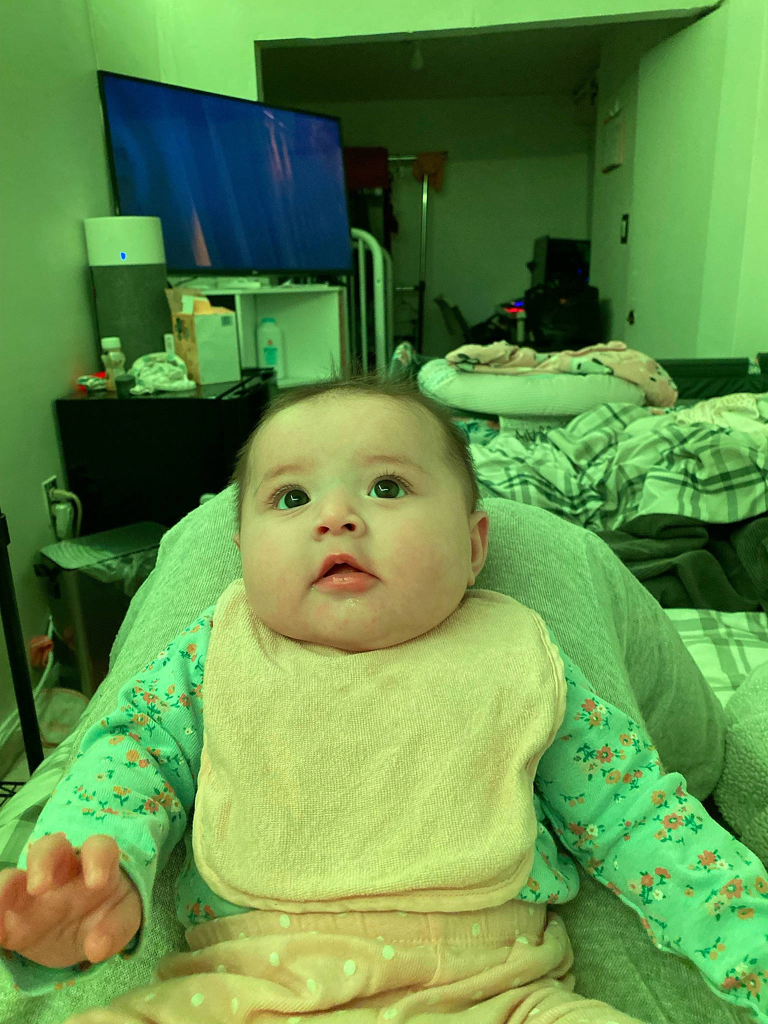 Alani joined the competition — help win amazing prizes! baby, baby_products, baby_safety, baby_toddler_clothing, bib, blurred, chair, cheek, child, comfort, curtain, happy, iris, linens, mammal, mouth, person, room, sitting, skin