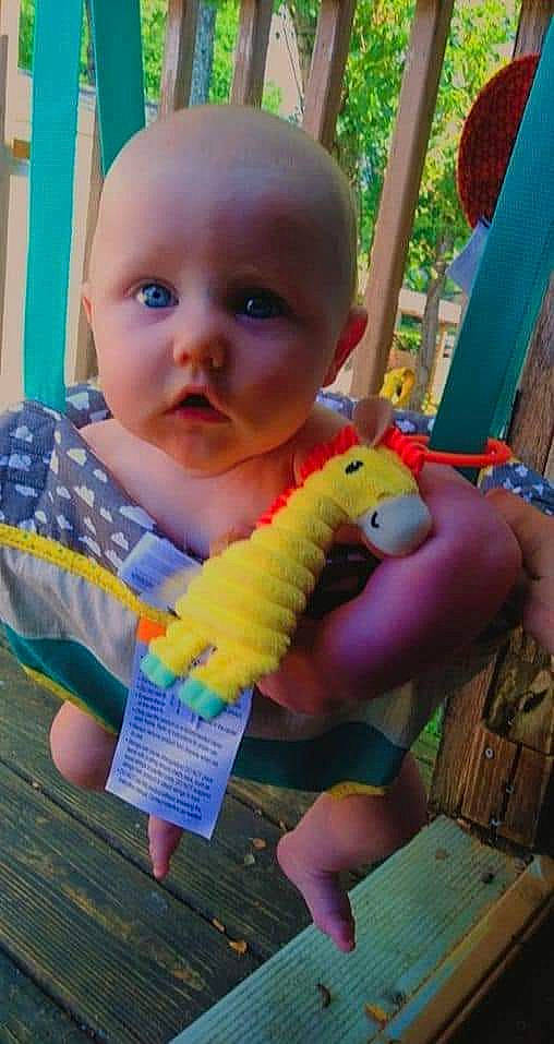 Richard Jr is registered to the contest to win money with this photo: baby, baby_products, baby_toddler_clothing, cheek, child, finger, fun, grass, hand, happy, nail, nose, person, pink, skin, smile, summer, thumb, toddler, toy