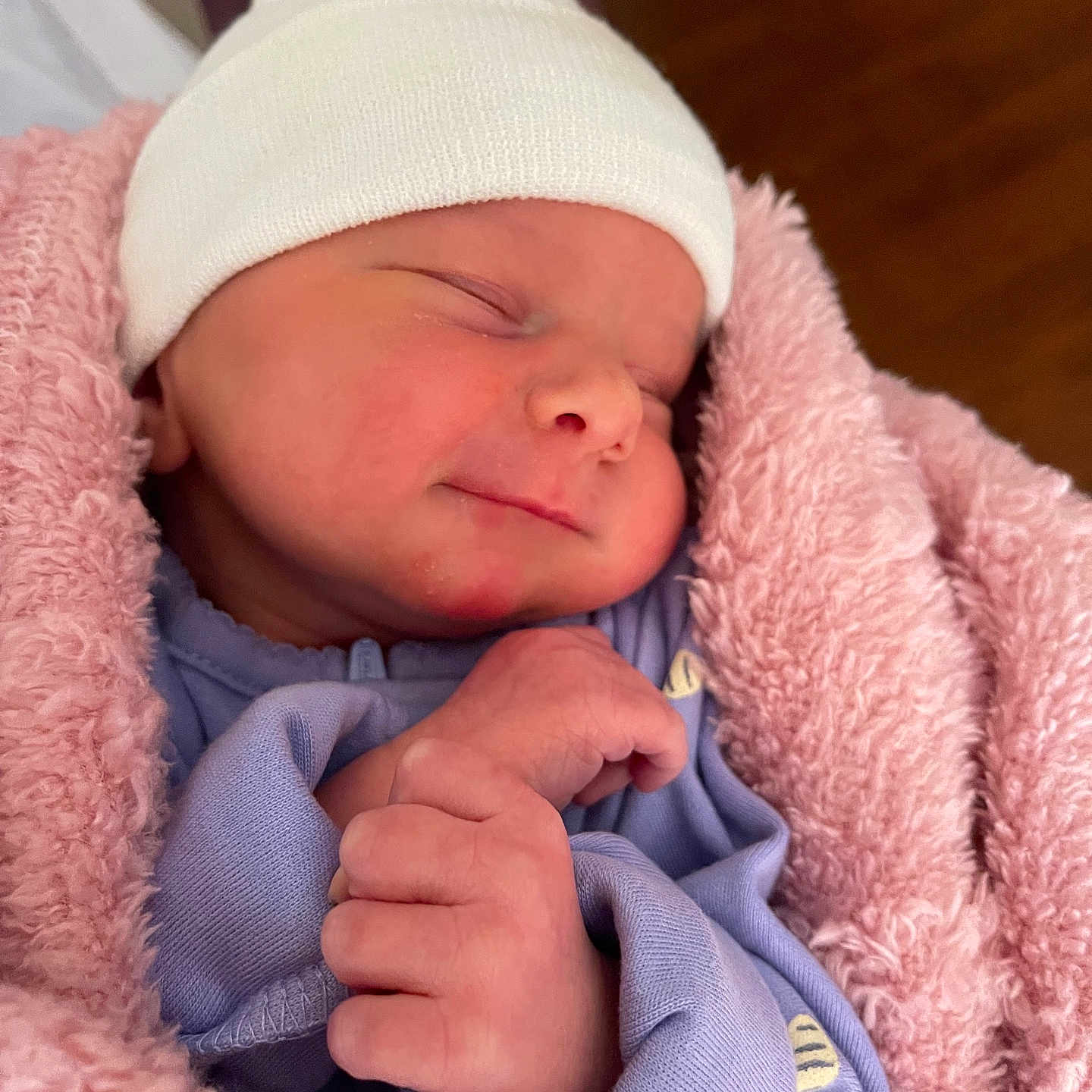 Marlie is registered to the contest to win money with this photo: baby, beanie, blanket, bodypart, bonnet, cap, clothing, face, finger, hand, hat, head, hood, newborn, person, photography, portrait, quilt, sleeping, towel