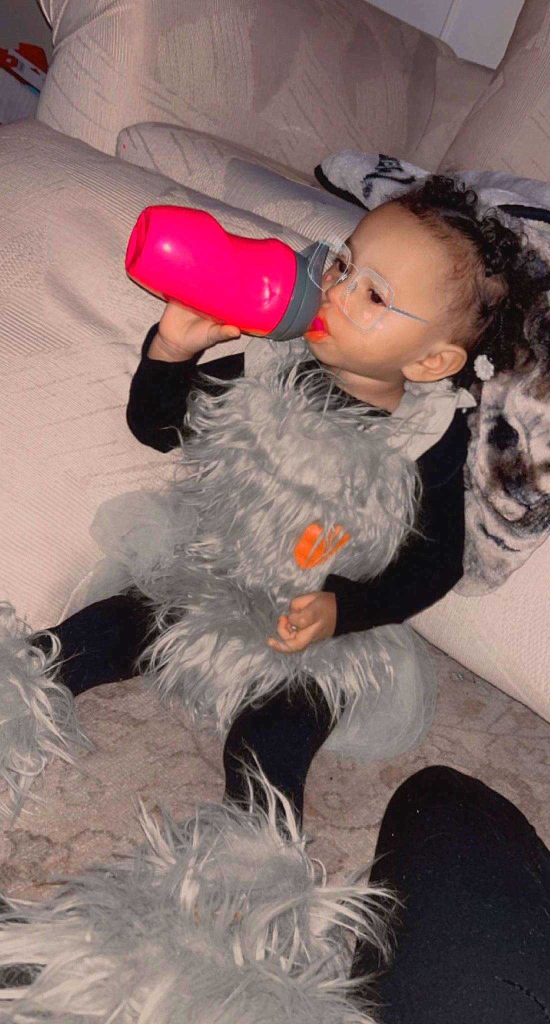 Kaydence joined the competition — help win amazing prizes! baby, child, costume, event, eye, face, flash_photography, flooring, fun, fur, glove, happy, hat, head, human_body, leisure, person, personal_protective_equipment, toddler, toy