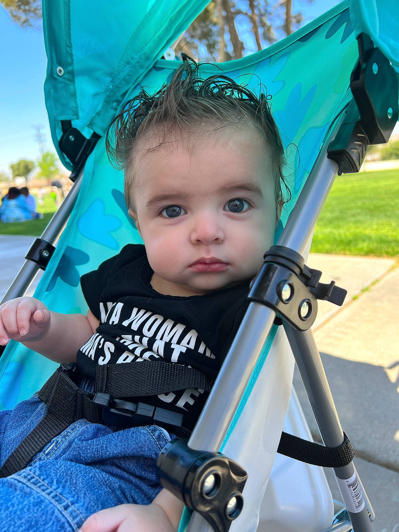 Achilles is registered to the contest to win money with this photo: azure, baby, baby_carriage, blue, child, cool, electric_blue, fun, grass, green, hand, happy, leisure, light, person, photograph, product, snapshot, summer, toddler