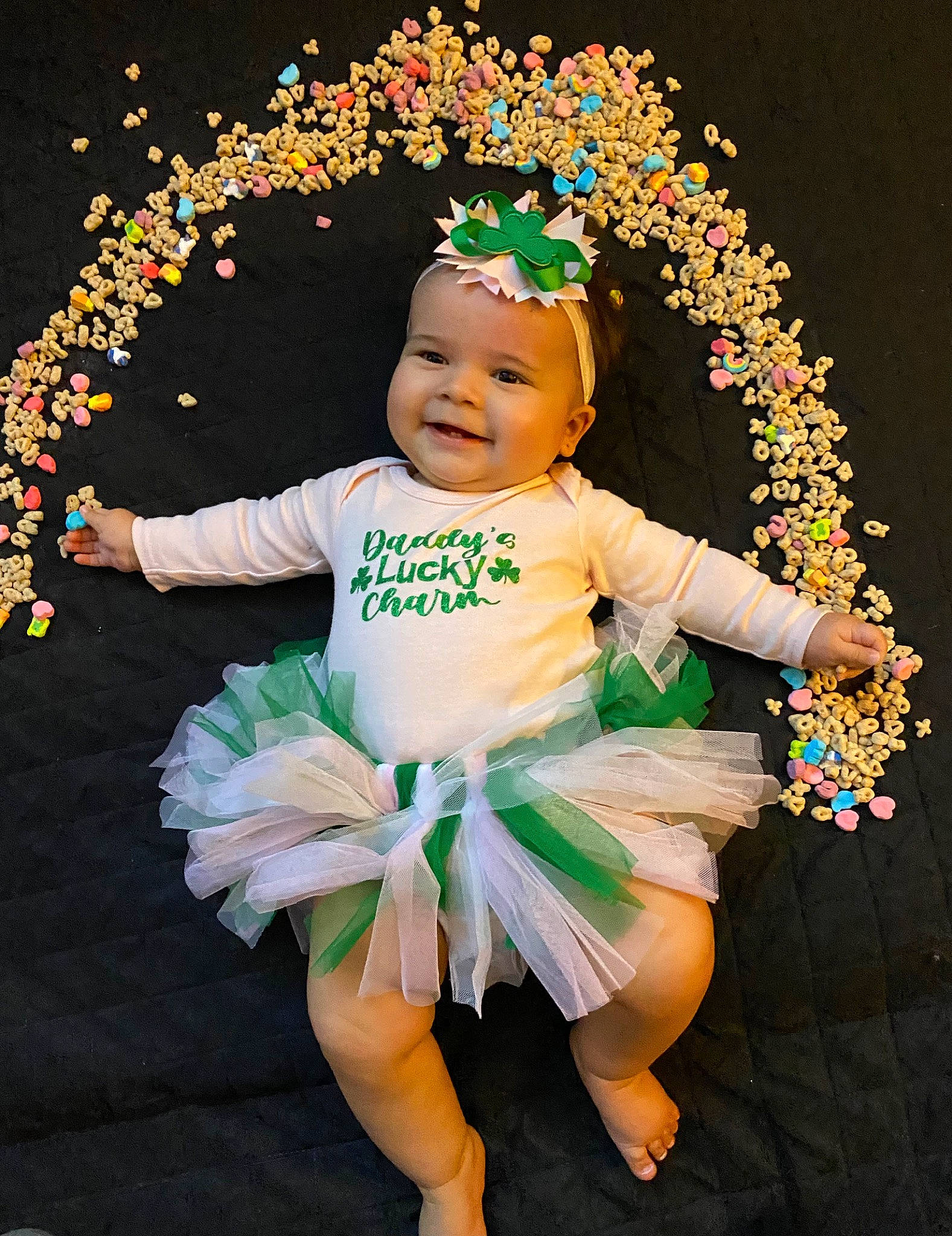 Sarai is registered to the contest to win money with this photo: baby, baby_toddler_clothing, ballet_tutu, child, costume, costume_hat, entertainment, event, fashion_accessory, fun, happy, hat, headpiece, headwear, jewellery, joy, lei, party_supply, performing_arts, person