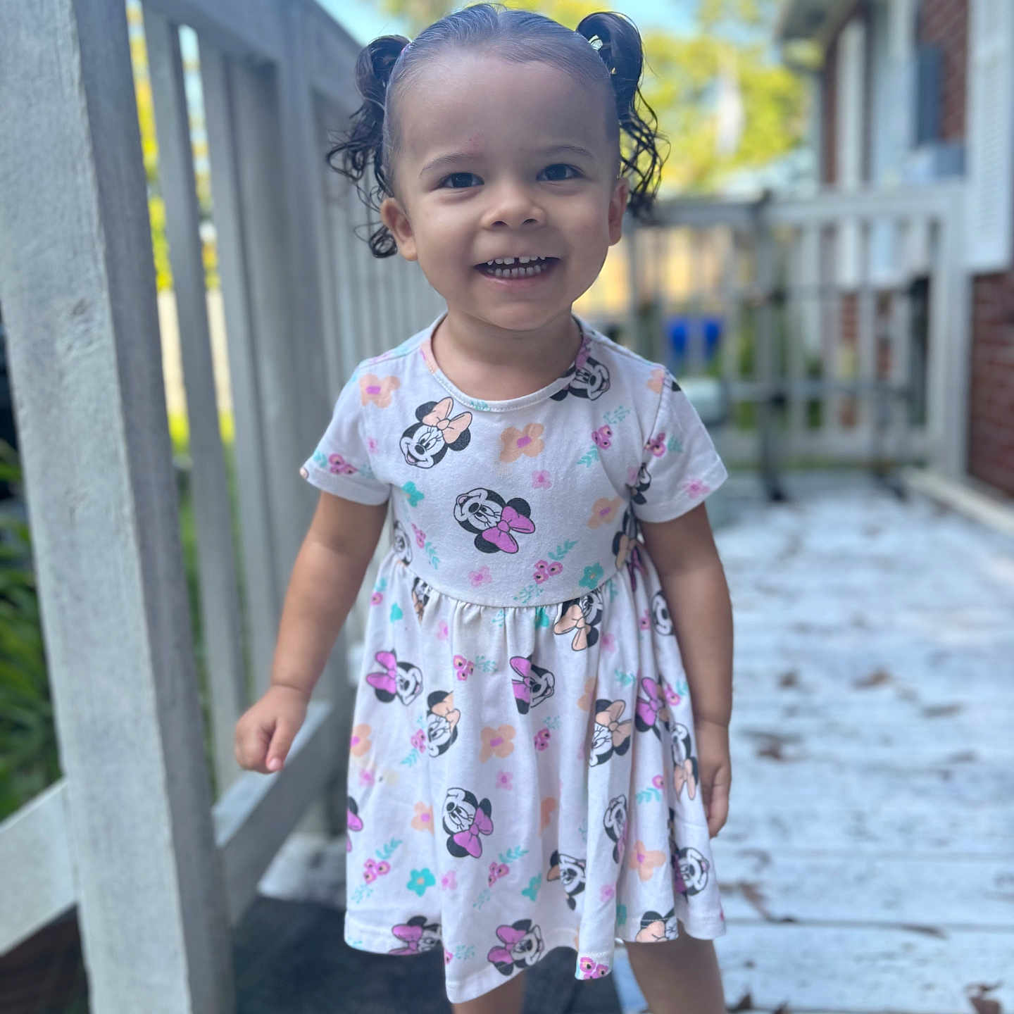 Sarai is registered to the contest to win money with this photo: child, clothing, dress, eveningdress, face, female, formalwear, girl, handrail, happy, head, longsleeve, path, person, photography, portrait, sleeve, smile, standing, walkway