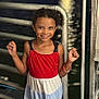 bracelet, child, city_lights, cute, dress, evening, fashion, girl, happy, metal, night, outdoor, person, portrait, railing, sandals, smile, standing, urban, water