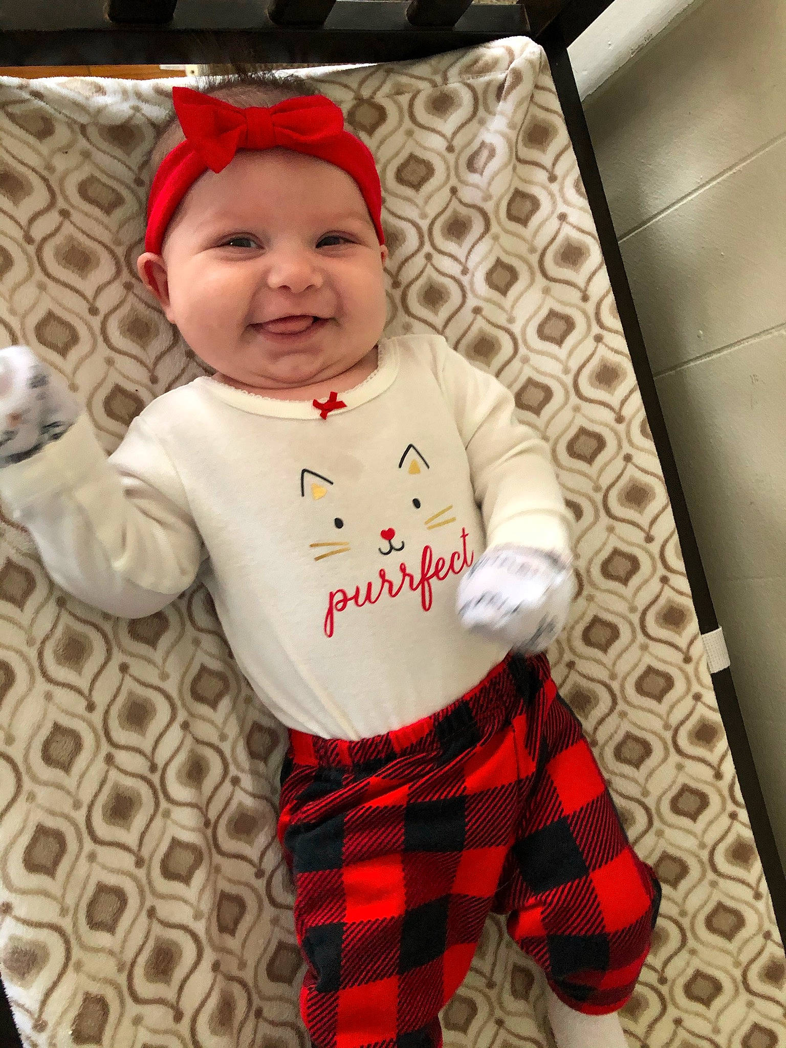 Korra is registered to the contest to win money with this photo: baby, baby_laughing, baby_toddler_clothing, carmine, carnivore, christmas, costume, costume_accessory, costume_hat, fictional_character, headwear, joy, laugh, pajamas, pattern, person, plaid, pleased, sleeve, smile