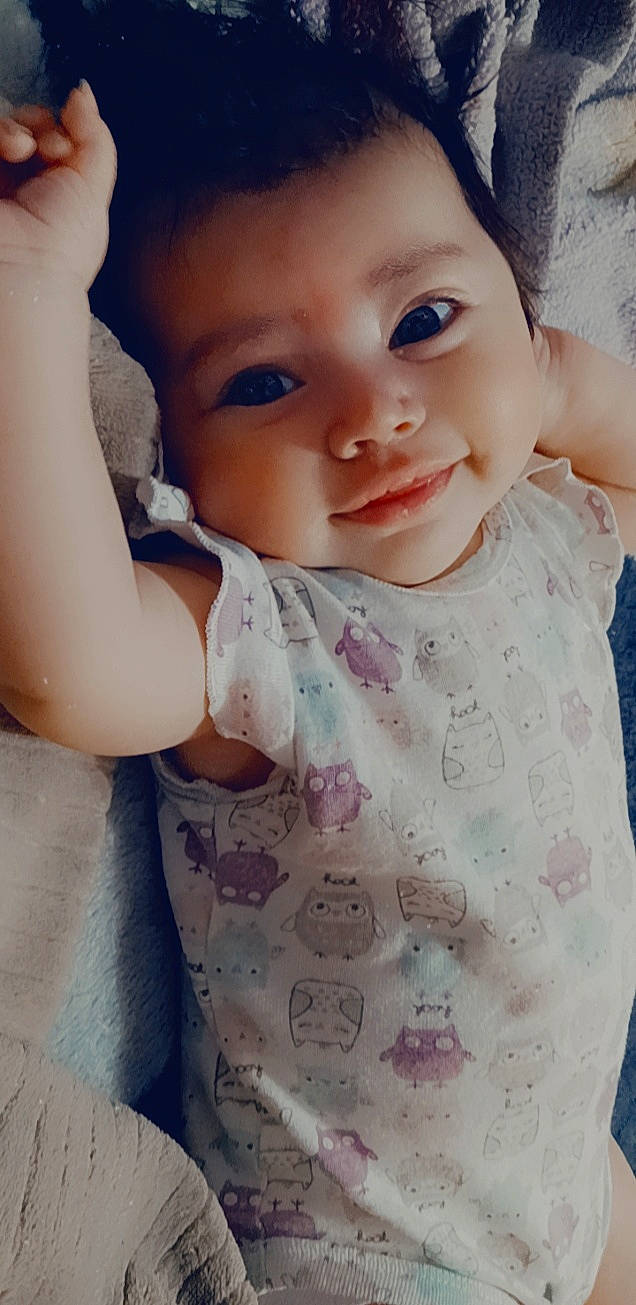 Alaya is registered to the contest to win money with this photo: arm, azure, baby_toddler_clothing, cheek, chin, eye, eyebrow, hairstyle, human_body, joint, lip, mouth, neck, nose, organ, person, photograph, product, shoulder, skin