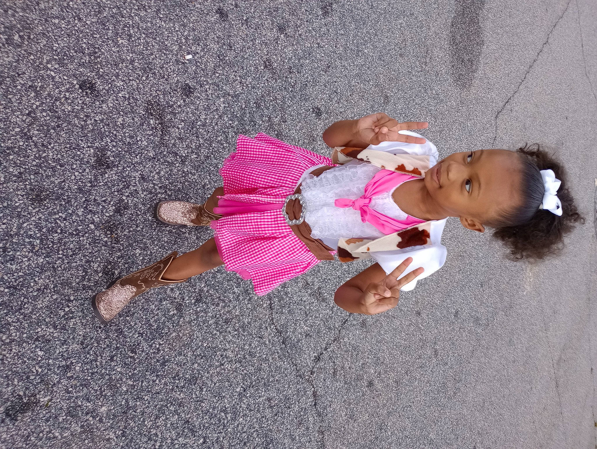 Shi'Laia is registered to the contest to win money with this photo: asphalt, baby_toddler_clothing, child, concrete, eyewear, fashion_accessory, foot, fun, human_leg, leisure, magenta, person, recreation, road_surface, sidewalk, sitting, sleeve, toddler, tree, vacation