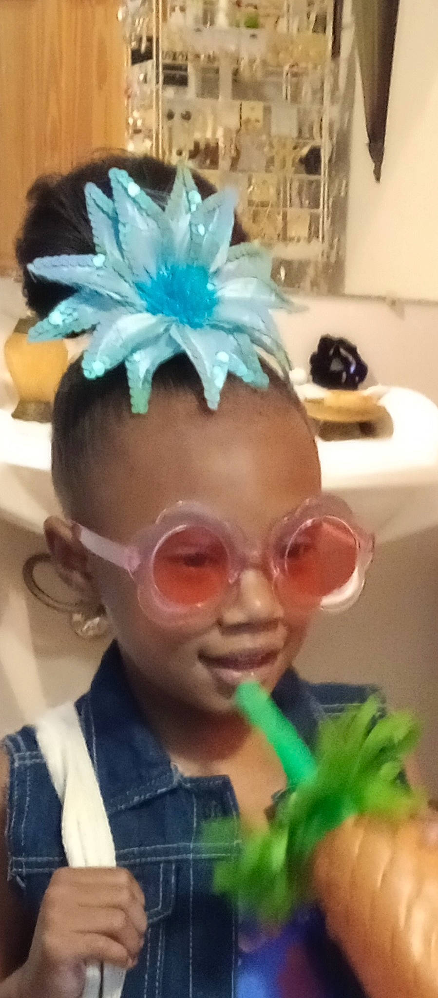 Shi'Laia is registered to the contest to win money with this photo: blue, cool, costume_hat, event, eyebrow, eyelash, eyewear, forehead, fun, hair, hairstyle, happy, head, headgear, headpiece, party_supply, person, personal_protective_equipment, snapshot, sunglasses