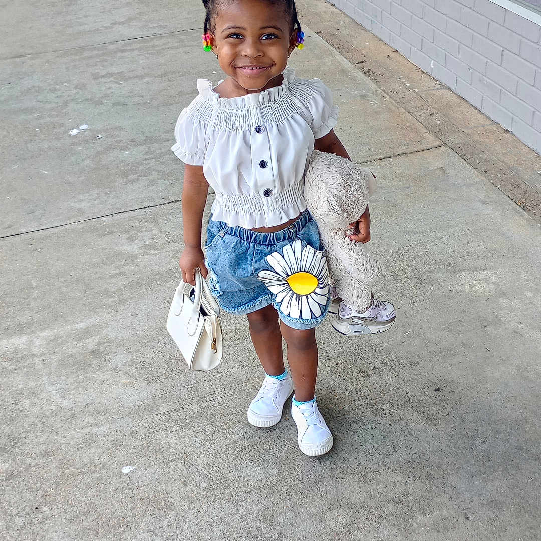 St'Phani joined the competition — help win amazing prizes! child, city, clothing, face, female, footwear, girl, head, pants, path, person, photography, portrait, road, shoe, shorts, sidewalk, street, urban, walking
