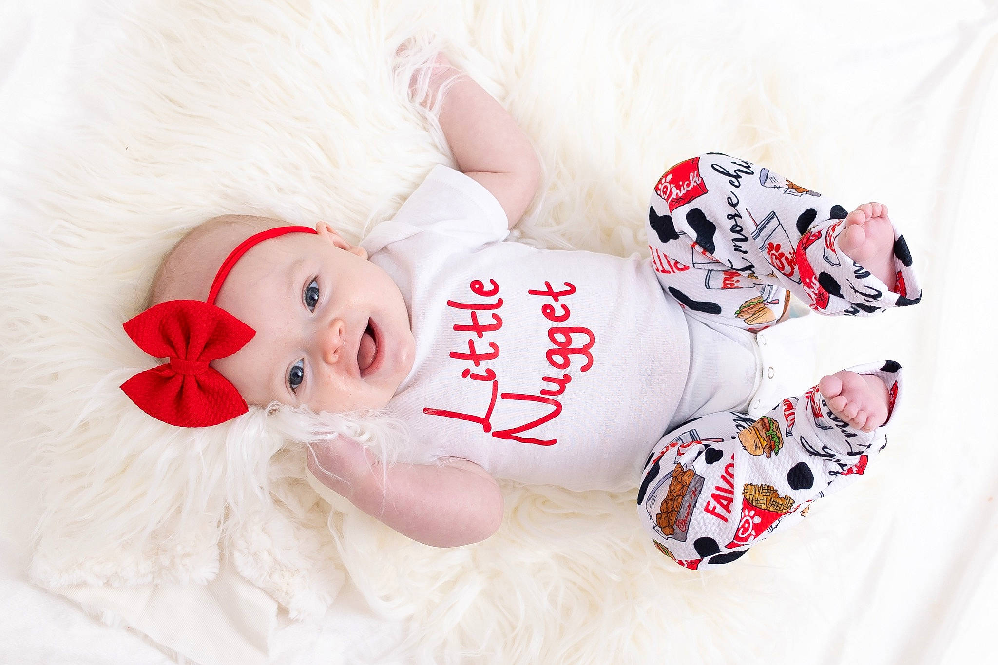 Kensley joined the competition — help win amazing prizes! baby, baby_toddler_clothing, carmine, child, christmas, costume, costume_hat, event, font, fur, hair_accessory, happy, hat, head, headwear, holiday, pattern, person, sleeve, smile