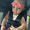 Sophie joined the competition — help win amazing prizes! baby, child, car_seat, safety_harness, headband, pink, blue_eyes, blanket, clothing, infant, cute, portrait, seatbelt, car, small_hands, looking_away, indoor, soft_light, young, adorable