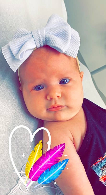 Everleigh Olevia Garcia is registered to the contest to win money with this photo: azure, cap, cheek, eyebrow, eyelash, face, facial_expression, happy, human, iris, lip, nose, organ, person, pink, product, purple, skin, textile, violet