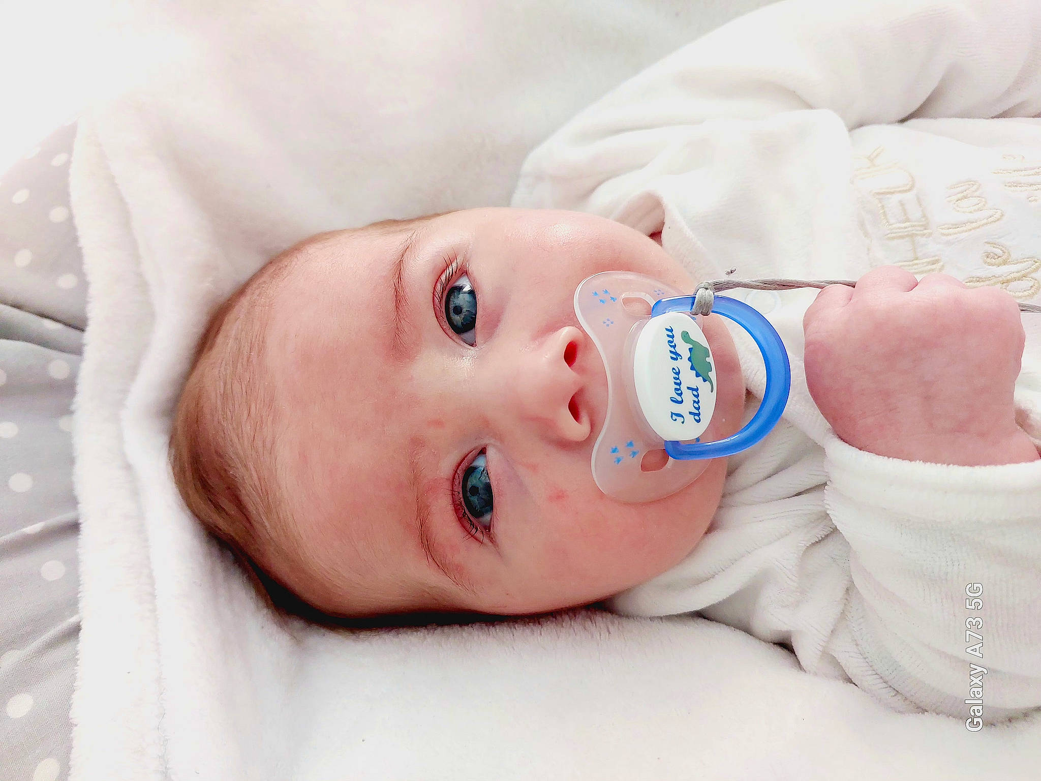 Sohan a rejoint le concours — aidez-le/la à gagner de superbes lots ! baby, baby_products, baby_safety, baby_sleeping, baby_toddler_clothing, cheek, child, comfort, drinkware, eye, eyelash, facial_expression, hat, linens, lip, nose, person, skin, sleeve, textile