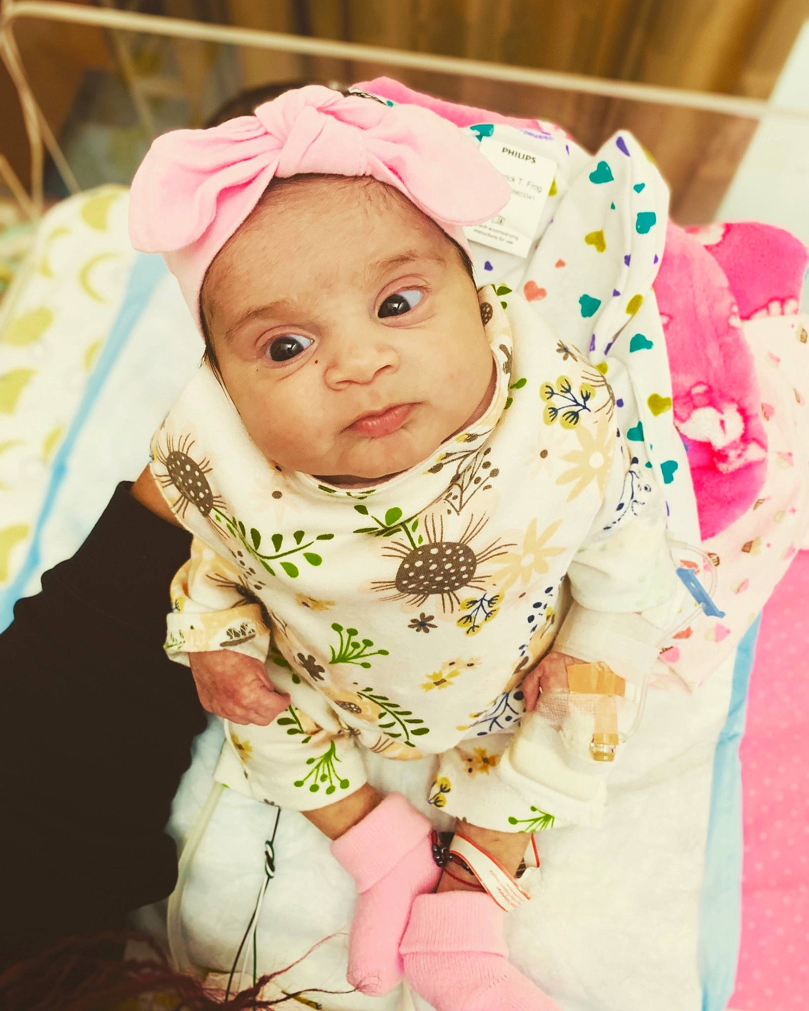 Xyla is registered to the contest to win money with this photo: baby, beauty, cheek, child, child_model, daughter, hair_accessory, headgear, outerwear, person, pink, skin, smile, toddler