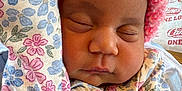 Keanani joined the competition — help win amazing prizes! baby, blanket, bonnet, cap, clothing, coat, cushion, face, glove, hat, head, homedecor, hood, jacket, newborn, person, photography, portrait, quilt, sleeping
