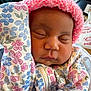 baby, blanket, bonnet, cap, clothing, coat, cushion, face, glove, hat, head, homedecor, hood, jacket, newborn, person, photography, portrait, quilt, sleeping
