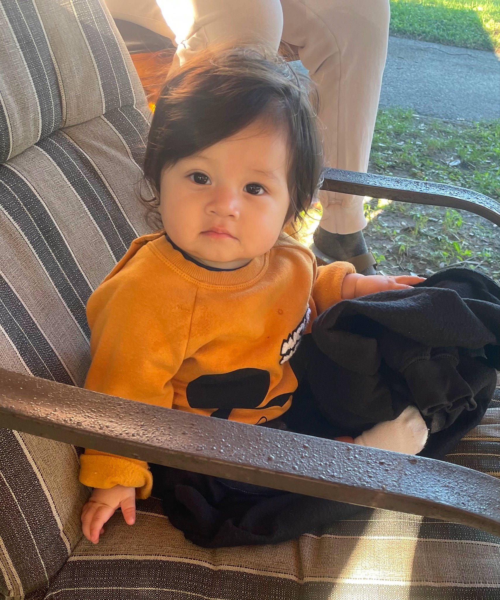 Myla is registered to the contest to win money with this photo: baby, baby_carriage, baby_products, baby_toddler_clothing, car_seat, chair, child, comfort, eye, eyewear, fun, happy, head, leisure, person, plant, sitting, toddler, travel, tree