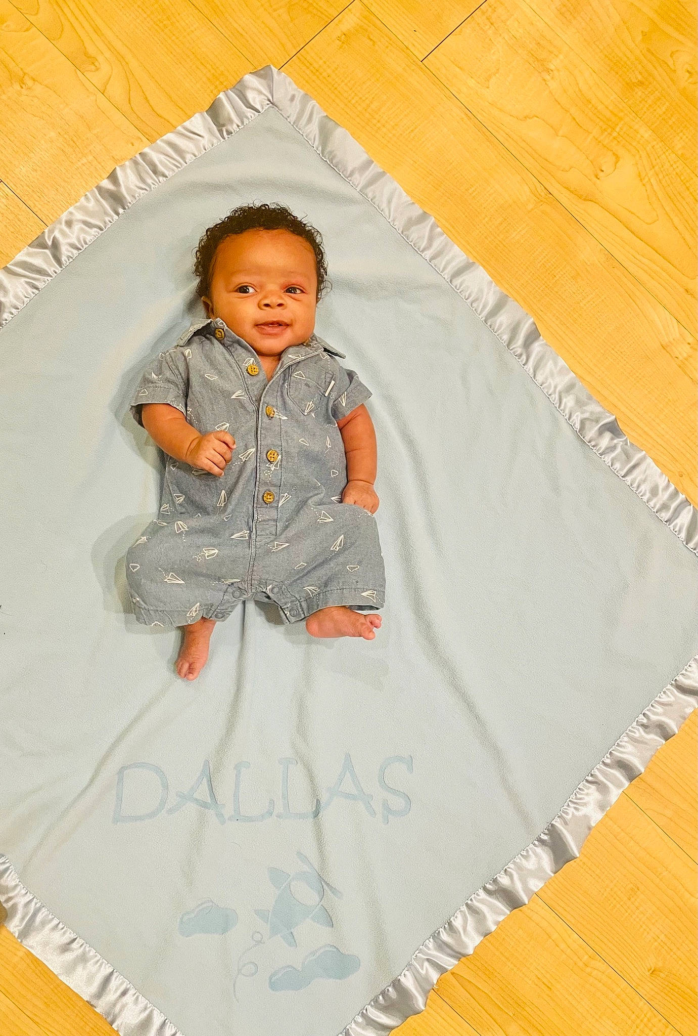 Dallas joined the competition — help win amazing prizes! baby, baby_products, baby_toddler_clothing, cheek, child, circle, comfort, flooring, hardwood, hoodie, jacket, linens, outerwear, pattern, person, room, sleeve, textile, toddler, wood