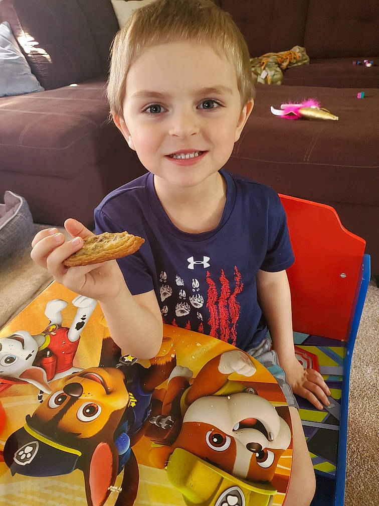 Jonathan is registered to the contest to win money with this photo: baby_toys, chair, child, event, finger, fun, happy, joy, junk_food, orange, organ, person, play, product, recreation, sharing, smile, snapshot, stuffed_toy, t_shirt