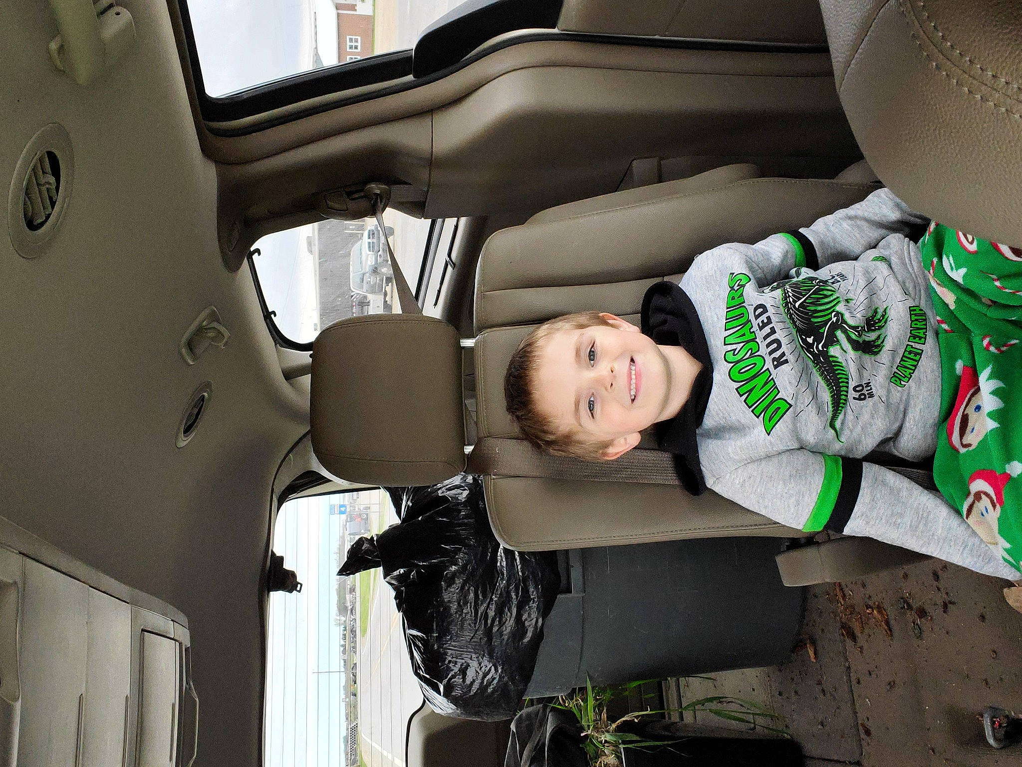 Jonathan is registered to the contest to win money with this photo: auto_part, automotive_design, automotive_exterior, automotive_tire, automotive_wheel_system, car, car_seat, car_seat_cover, family_car, hat, head_restraint, joy, luxury_vehicle, motor_vehicle, person, personal_luxury_car, smile, street_fashion, vehicle, vehicle_door