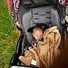 Remmi joined the competition — help win amazing prizes! baby, stroller, blanket, pacifier, cap, sleeping, infant, outdoor, grass, child, nap, toy, fabric, seat, person, relaxation, comfort, cute, bundle, accessory