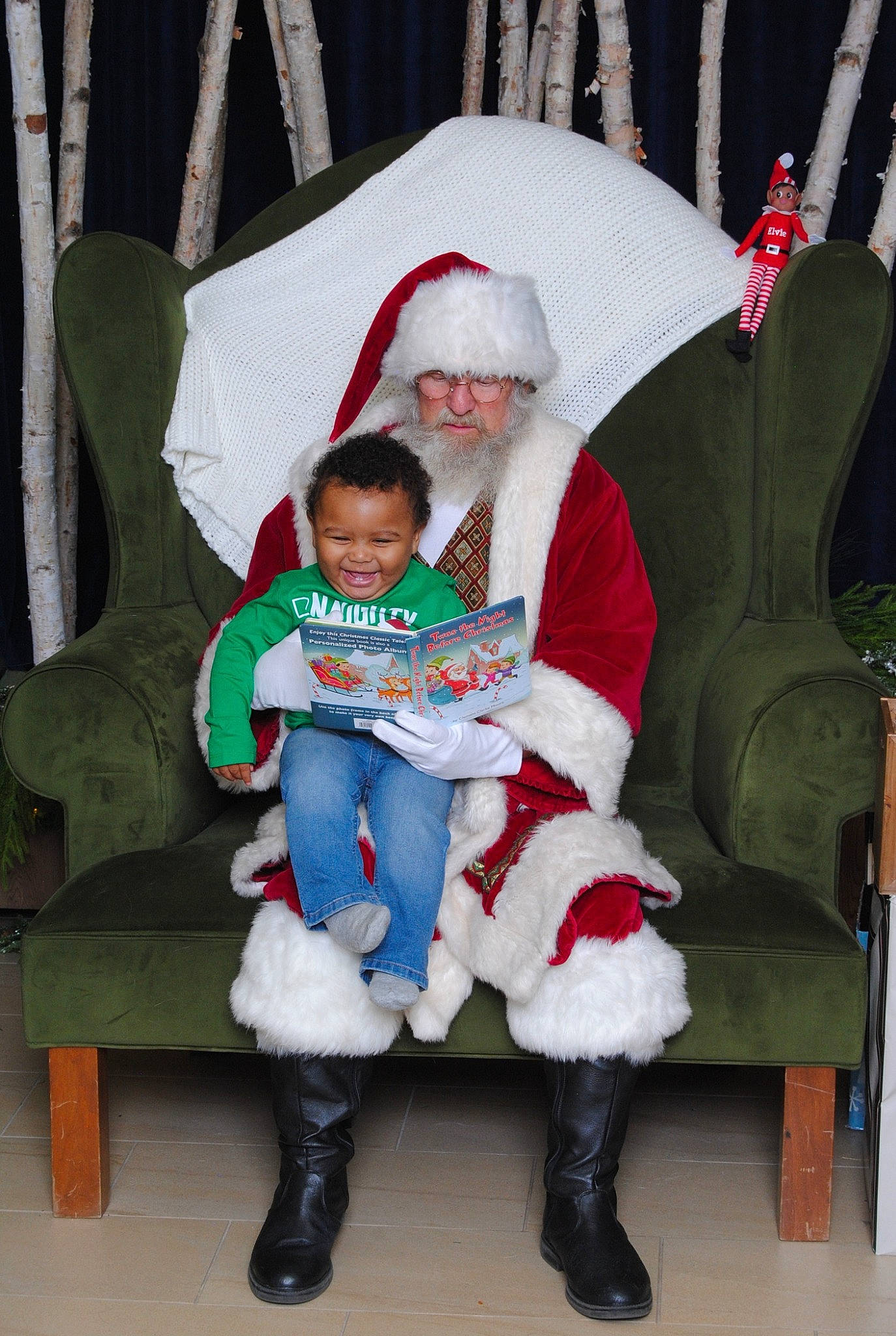 Darren joined the competition — help win amazing prizes! baby, boot, chair, christmas, christmas_eve, comfort, event, fictional_character, fun, happy, hat, headwear, holiday, human_body, joy, lap, leg, person, santa_claus, sitting