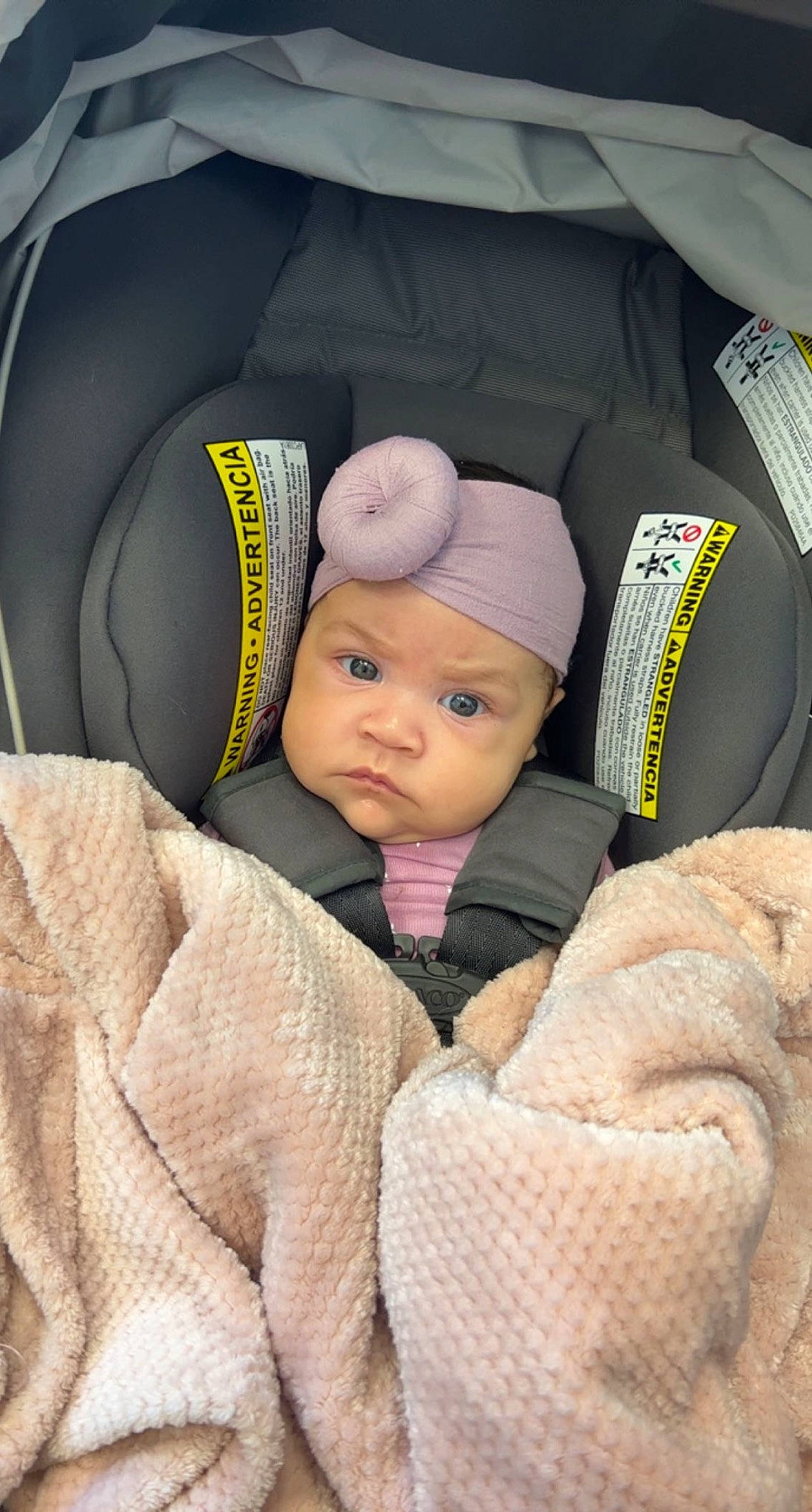 Londyn joined the competition — help win amazing prizes! baby, baby_carriage, baby_in_car_seat, baby_products, baby_safety, baby_sleeping, beanie, cap, car_seat, car_seat_cover, comfort, head_restraint, headgear, headwear, knit_cap, linens, luxury_vehicle, motor_vehicle, person, product