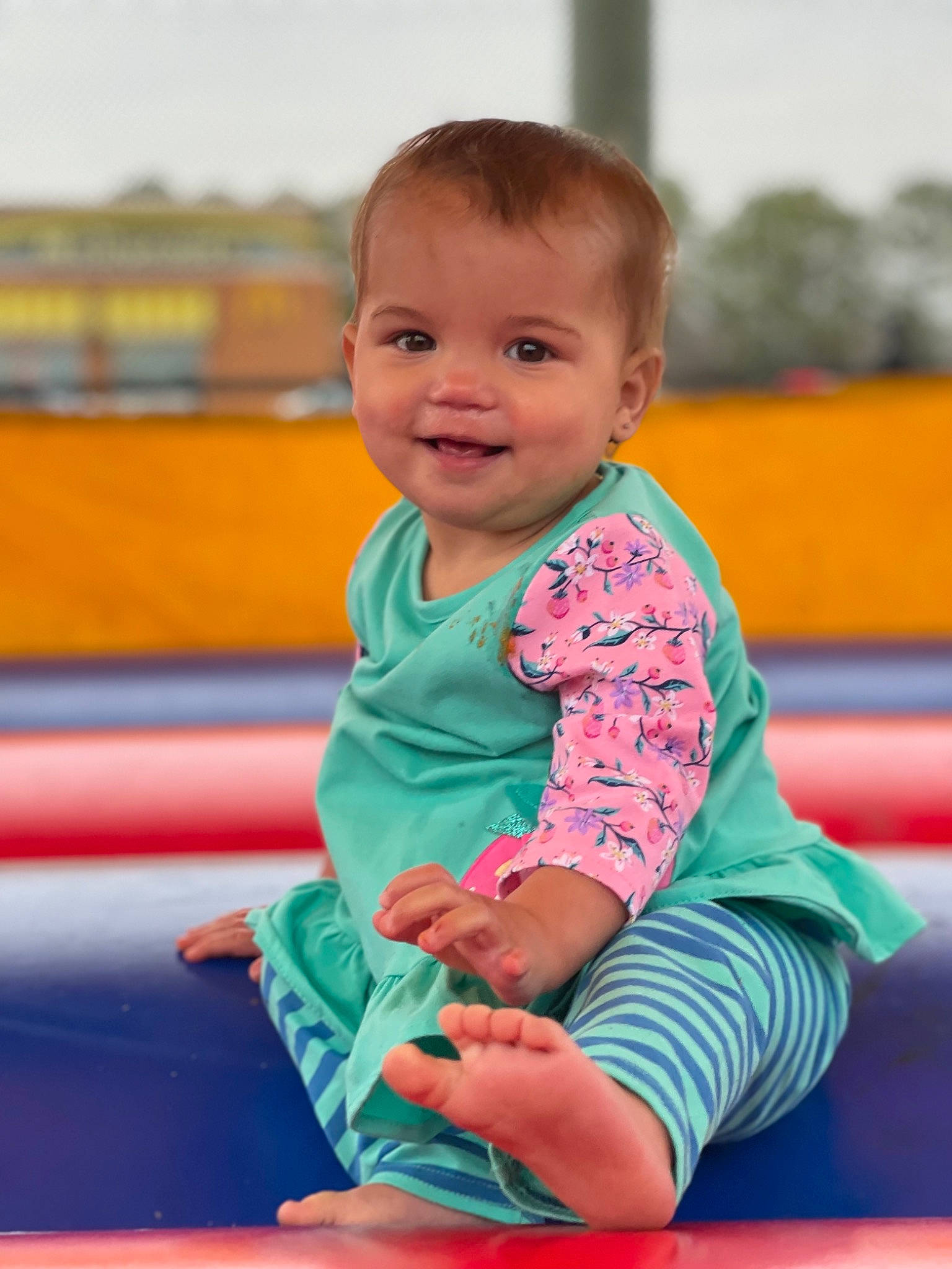 Halston joined the competition — help win amazing prizes! baby, baby_toddler_clothing, child, electric_blue, eye, face, fun, grass, happy, joy, leisure, magenta, person, play, recreation, sitting, skin, sky, sleeve, smile