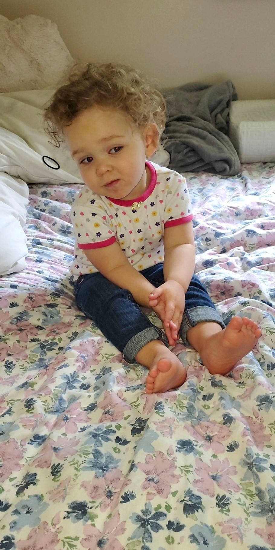 Melissa joined the competition — help win amazing prizes! baby, baby_toddler_clothing, barefoot, child, comfort, eye, face, floor, flooring, foot, hairstyle, head, human_body, human_leg, leg, linens, person, skin, sleeve, toddler