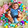 Brielle is registered to the contest to win money with this photo: baby, bunny_ears, denim_overalls, knitted_blanket, plastic_eggs, pink_bunny_plush, smiling, cute, easter, child, infant, playful, indoors, colorful, toy, holiday, festive, happy, lying_down, soft_texture