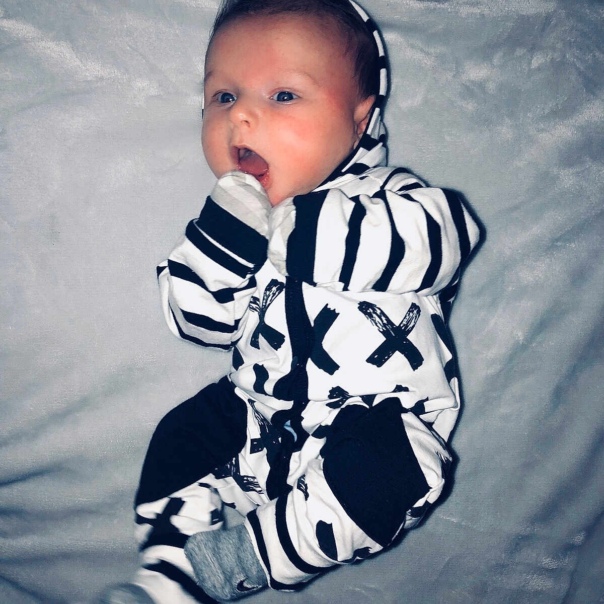 Adin joined the competition — help win amazing prizes! baby, bodypart, clothing, coat, electricaldevice, face, finger, glove, hand, head, hoodie, jacket, knitwear, newborn, pants, person, photography, portrait, sweater, sweatshirt