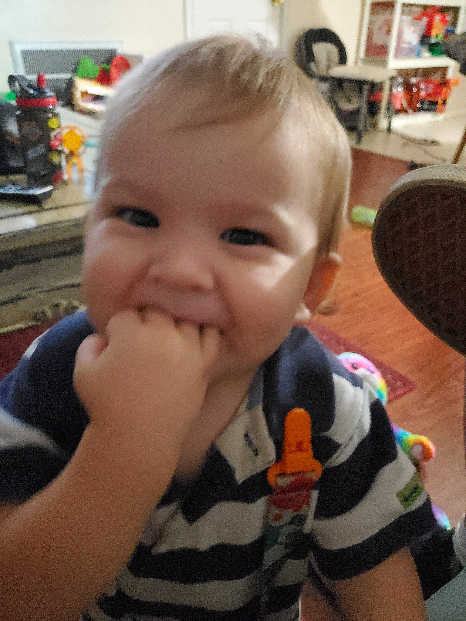 Luke is registered to the contest to win money with this photo: baby, cheek, child, ear, eating, face, facial_expression, finger, fun, head, joy, lip, mouth, nose, person, skin, smile, toddler