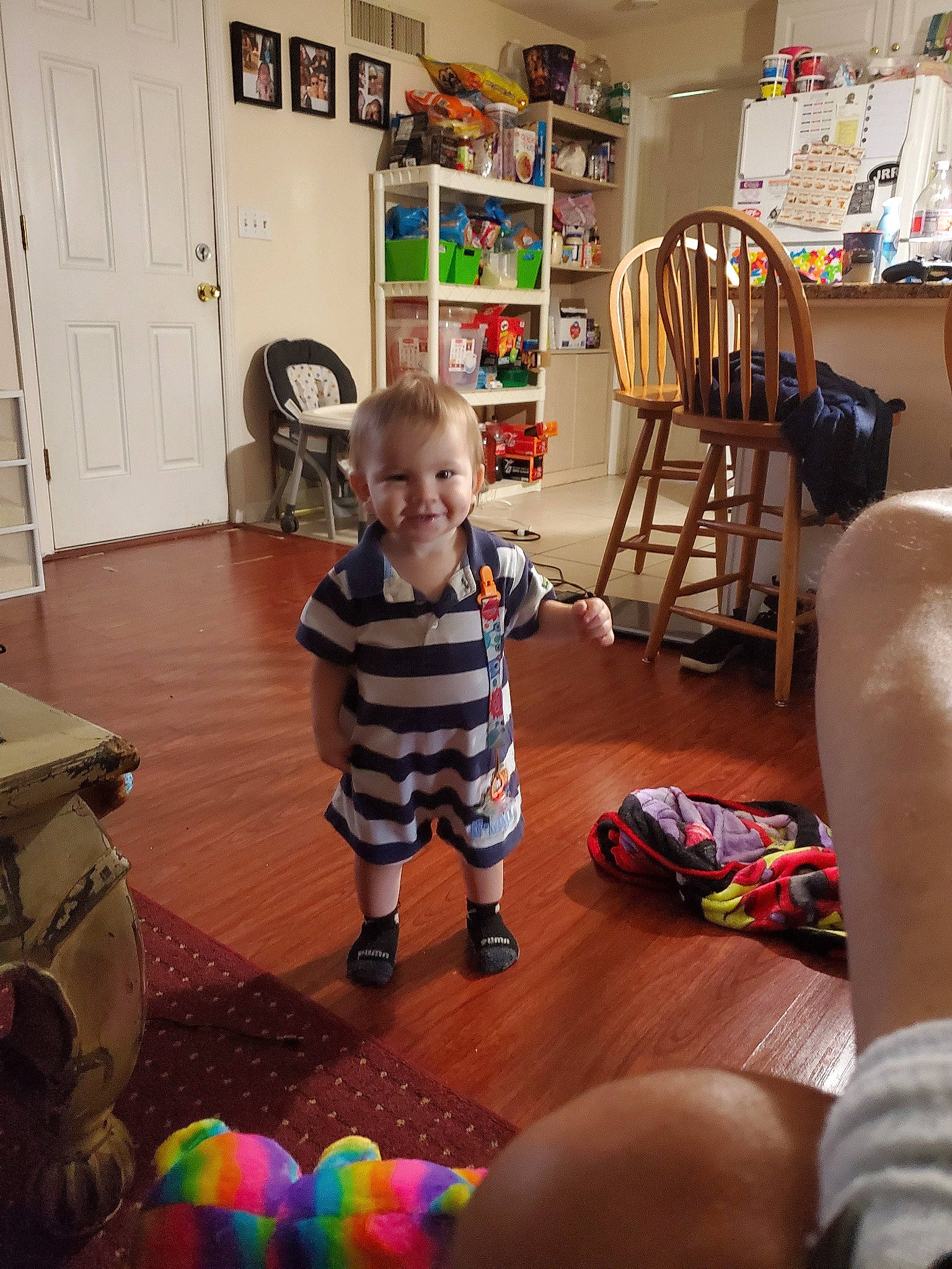 Luke is registered to the contest to win money with this photo: child, floor, flooring, fun, furniture, joy, living_room, person, play, room, toddler, toy