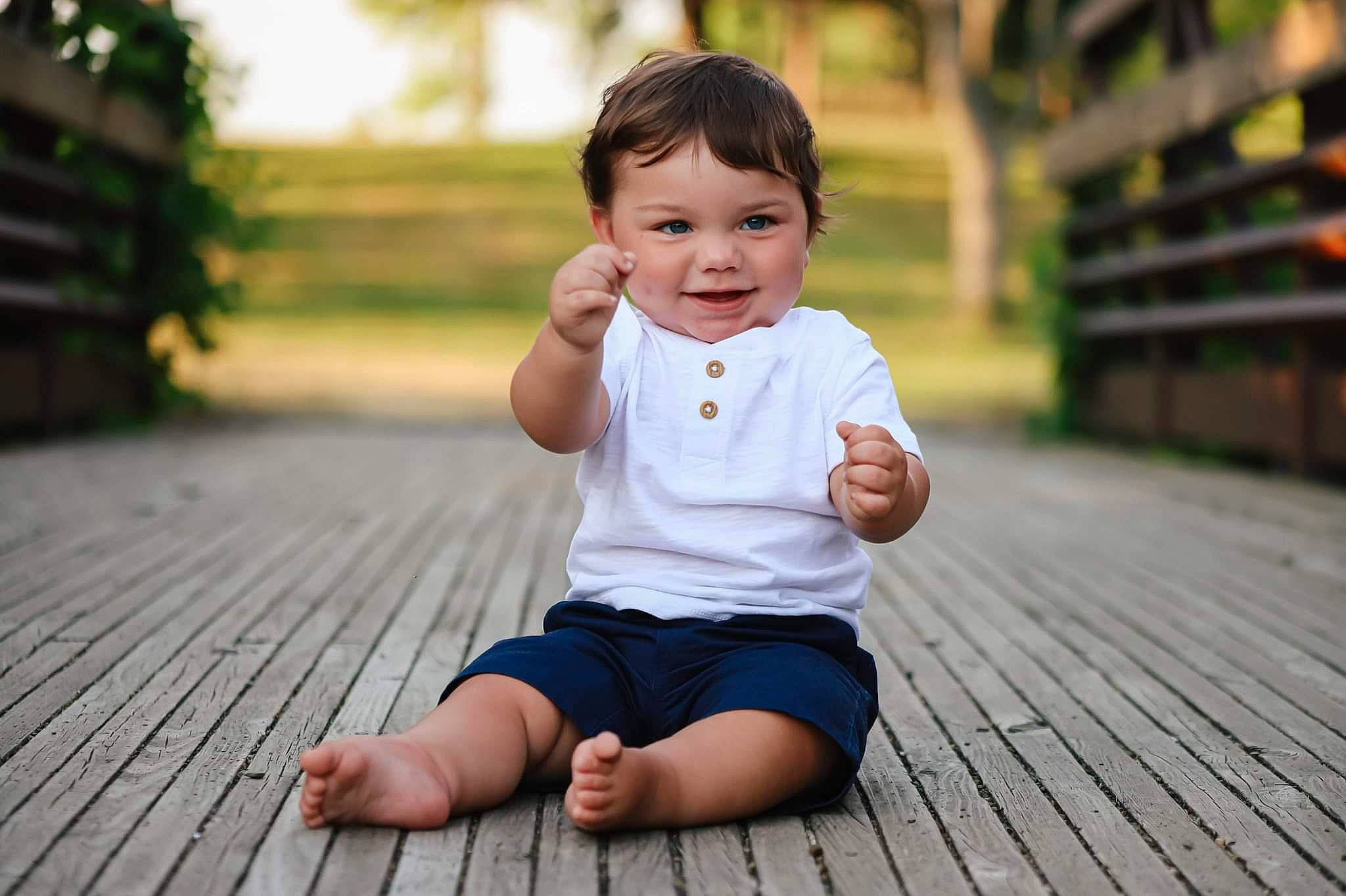 Kashton is registered to the contest to win money with this photo: baby, baby_toddler_clothing, beauty, chin, eye, face, flash_photography, flooring, grass, happy, hardwood, leisure, people_in_nature, person, plant, sitting, skin, smile, summer, toddler