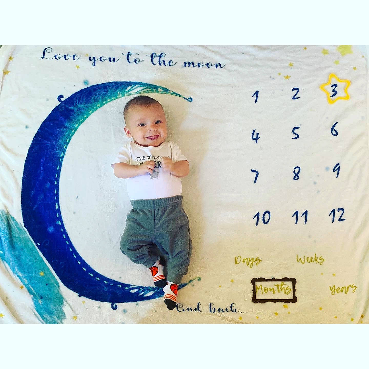 Braden joined the competition — help win amazing prizes! advertising, baby, baby_toddler_clothing, child, circle, electric_blue, fictional_character, font, happy, illustration, joy, pattern, people_in_nature, person, play, rectangle, sitting, sleeve, smile, t_shirt
