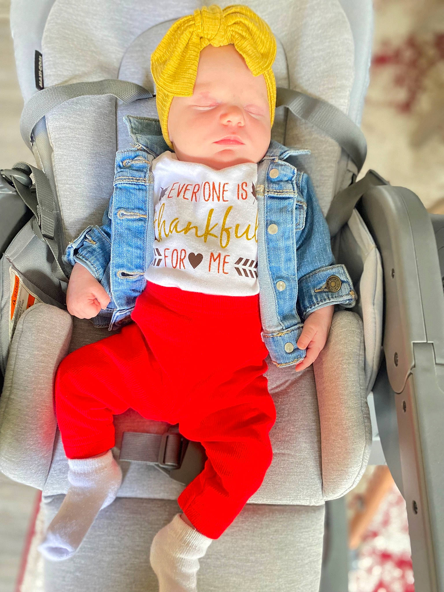 Fallon joined the competition — help win amazing prizes! baby, baby_carriage, baby_products, baby_safety, baby_sleeping, baby_toddler_clothing, bag, chair, child, comfort, electric_blue, fashion_accessory, orange, personal_protective_equipment, product, sitting, sleeve, thigh, toddler, white