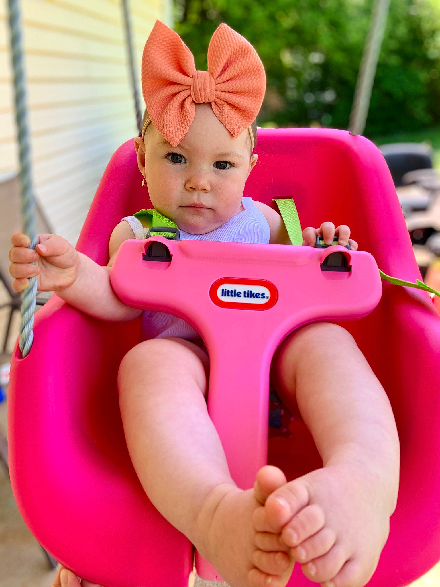 Kynnedi joined the competition — help win amazing prizes! baby, child, ear, fun, headwear, leg, outdoor_play_equipment, person, pink, play, product, public_space, recreation, smile, swing, toddler, toy