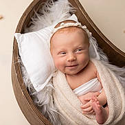 Elina is registered to the contest to win money with this photo: newborn, baby, infant, wrapped, blanket, headband, wooden_bowl, fur, star_decor, smile, cute, portrait, soft_texture, sleepy, cozy, indoors, skin, hands, feet, decor