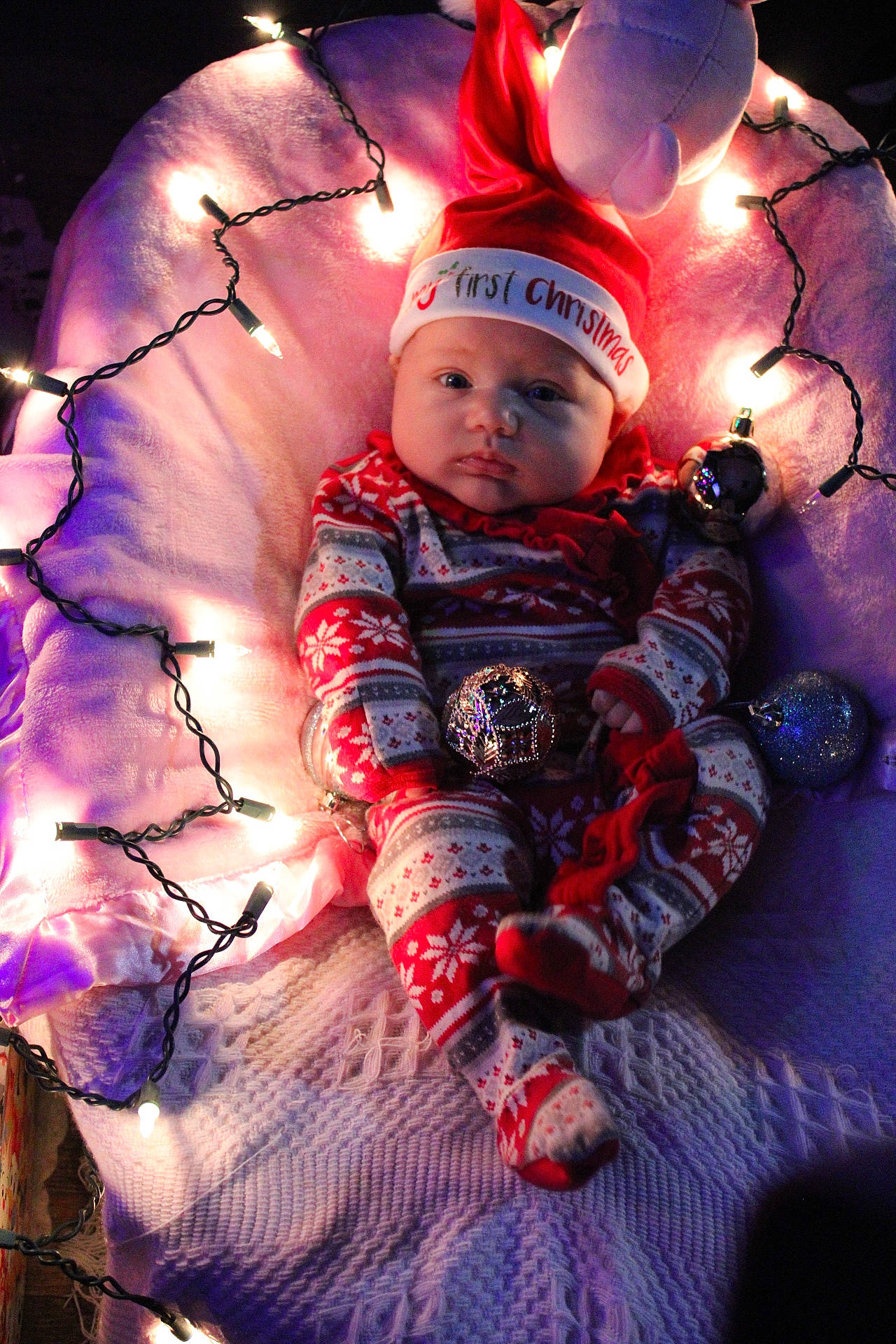 Elora is registered to the contest to win money with this photo: baby, baby_toddler_clothing, carmine, child, darkness, electric_blue, event, fictional_character, flash_photography, fun, happy, headwear, holiday, magenta, person, personal_protective_equipment, pink, purple, sitting, toddler