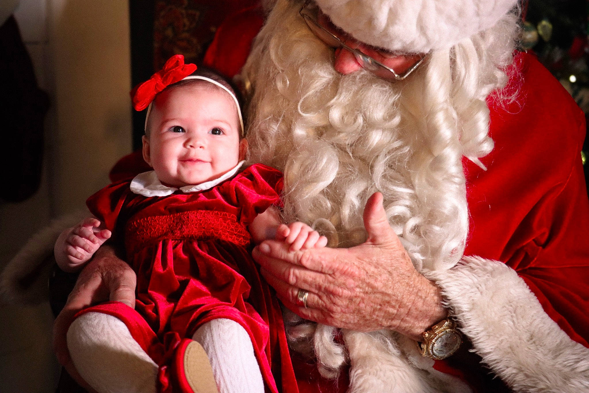 Lillian joined the competition — help win amazing prizes! baby, baby_toddler_clothing, beard, child, christmas, comfort, costume_hat, event, facial_expression, flash_photography, fun, happy, hat, holiday, lap, person, red, santa_claus, smile, toddler