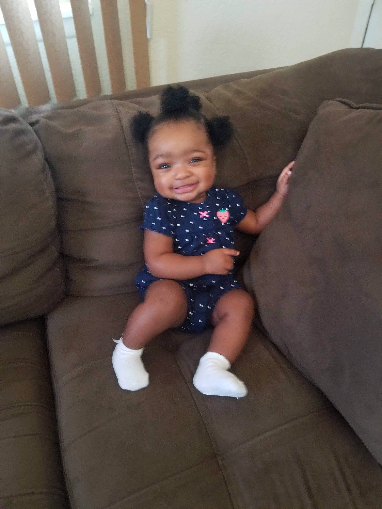 Kaydance is registered to the contest to win money with this photo: baby, cheek, child, electronic_device, floor, fun, head, joy, leg, person, play, sitting, skin, toddler, vacation